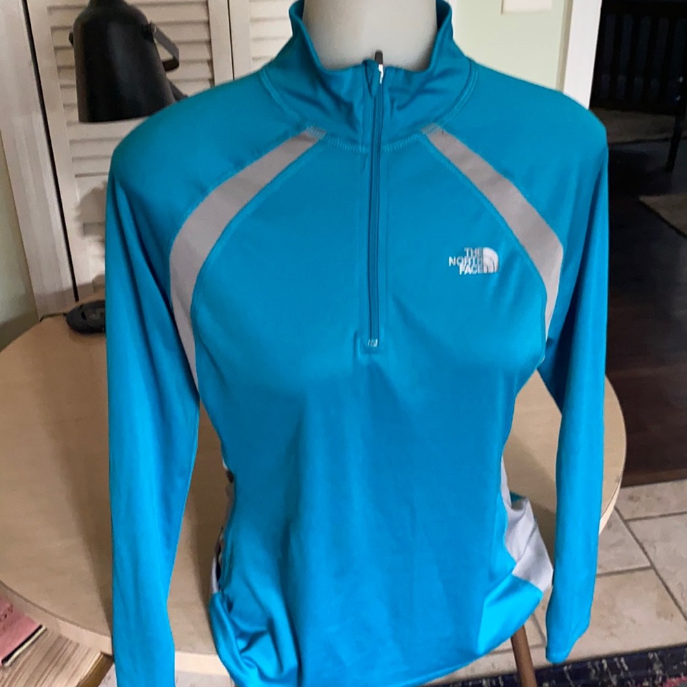 The North Face turquoise blue quarter zip pullover